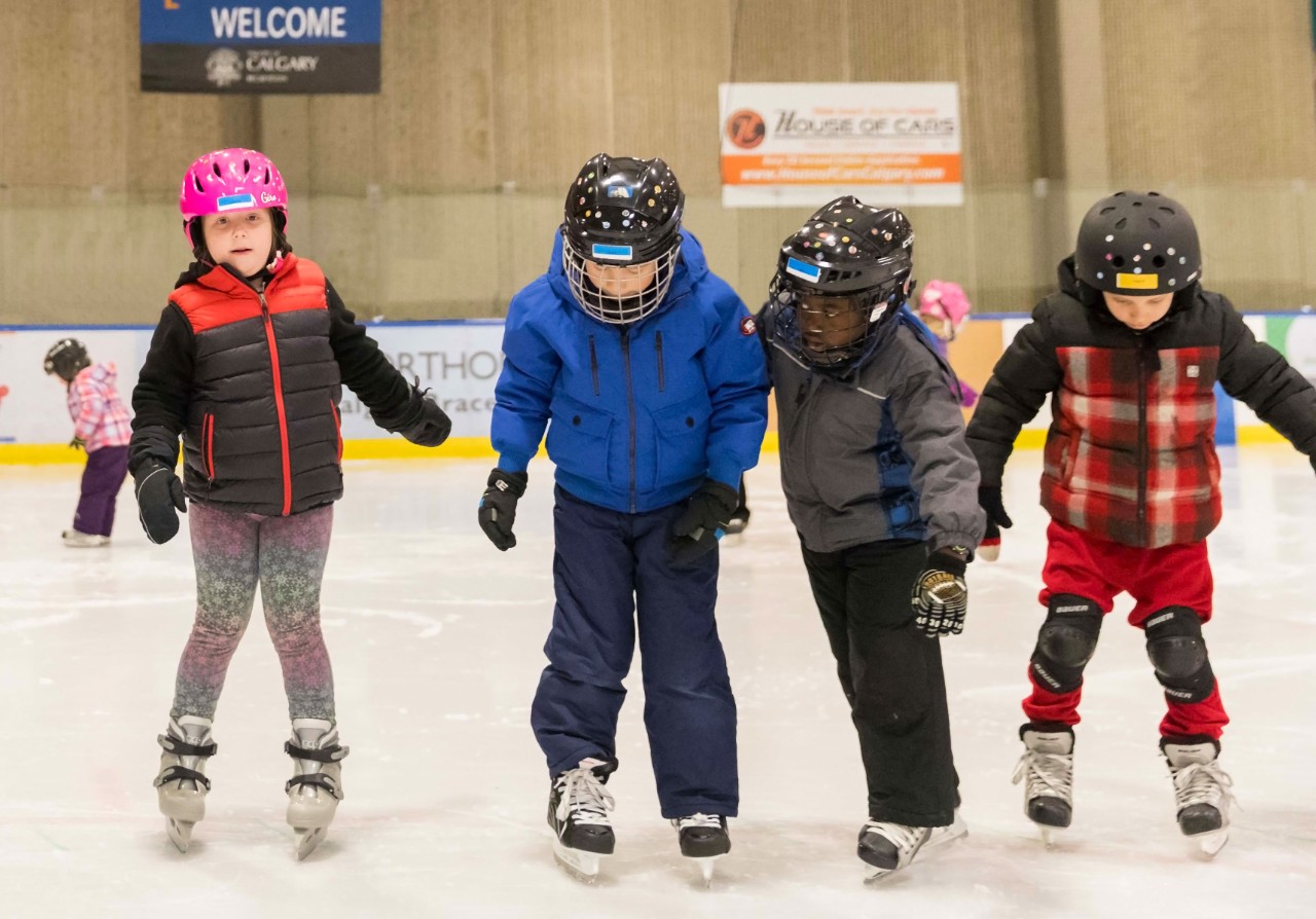 four kids skating